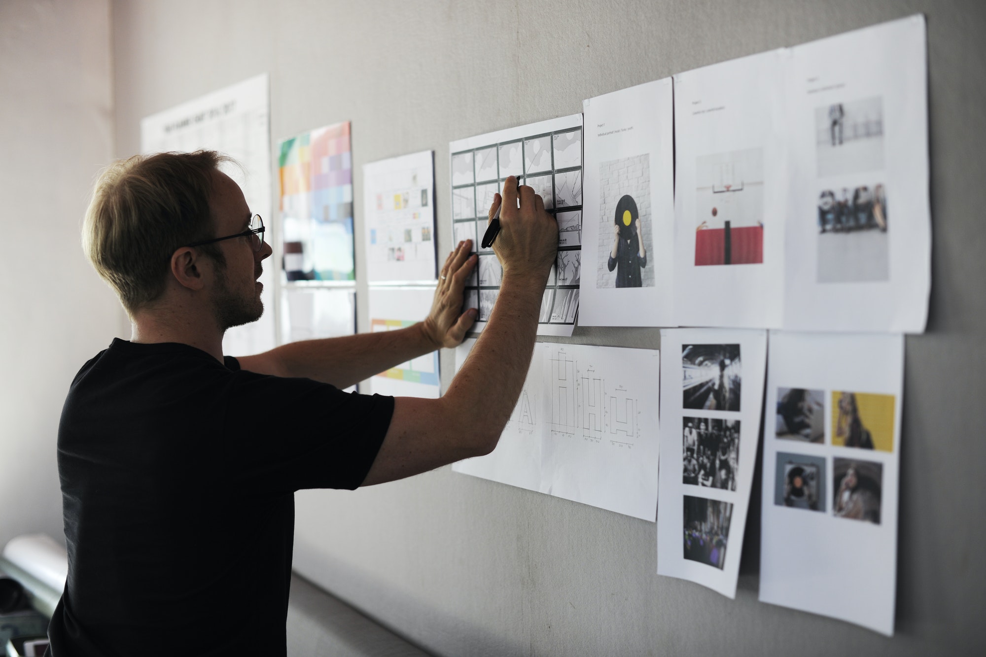 Startup Business People Looking on Strategy Board Information Thoughtful